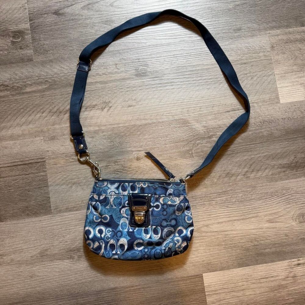 Coach Poppy Denim Print Swing Pack Crossbody, featuring a blue multi-pattern